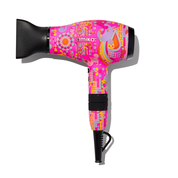 png image of a blowdryer with brand name amika and an abstract design with bright colours of pink, blue, purple, yellow and orange.