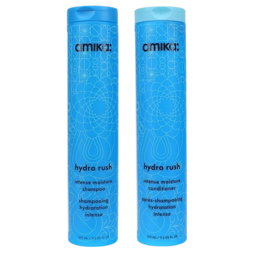 dark blue shampoo and conditioner bottles with black branding and a light blue abstract design.
